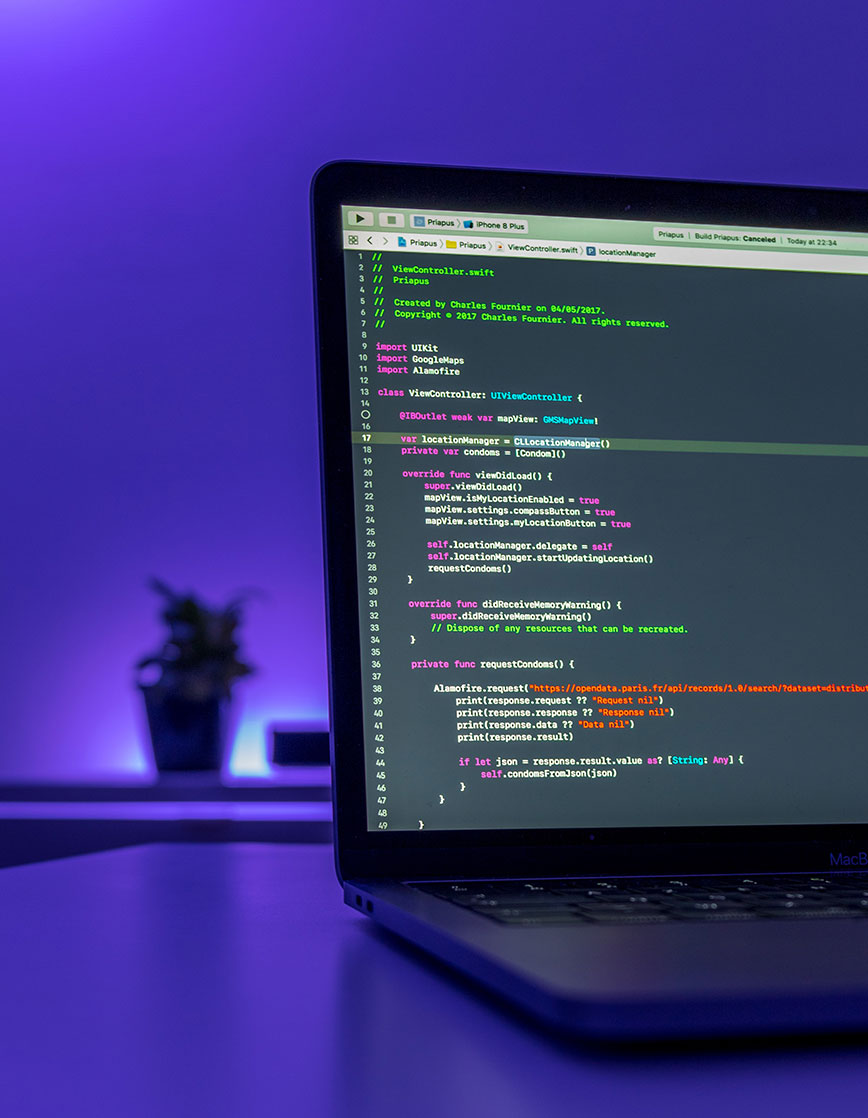 Laptop with Coding on Screen
